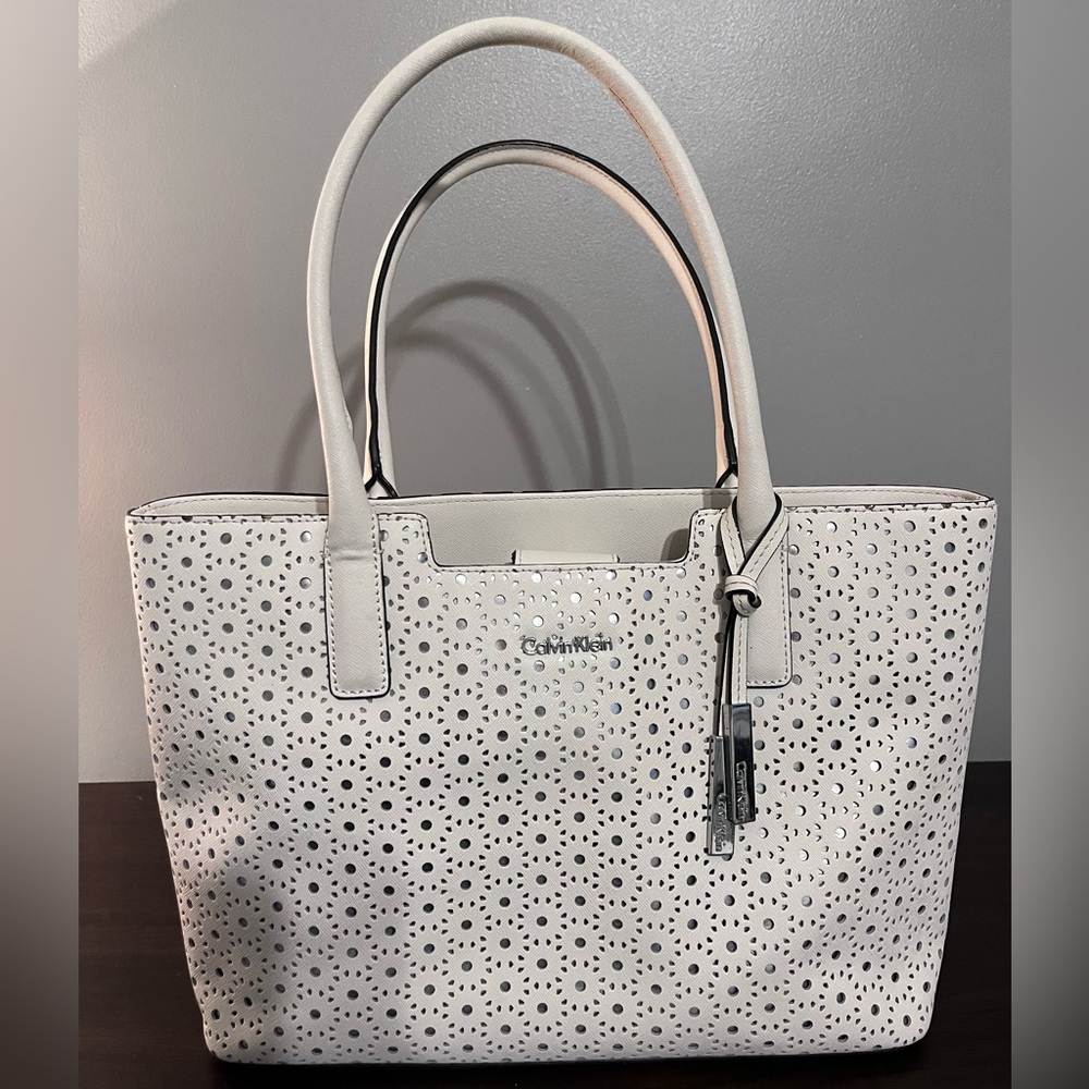 Large White Calvin Klein Tote with Silver Cutouts